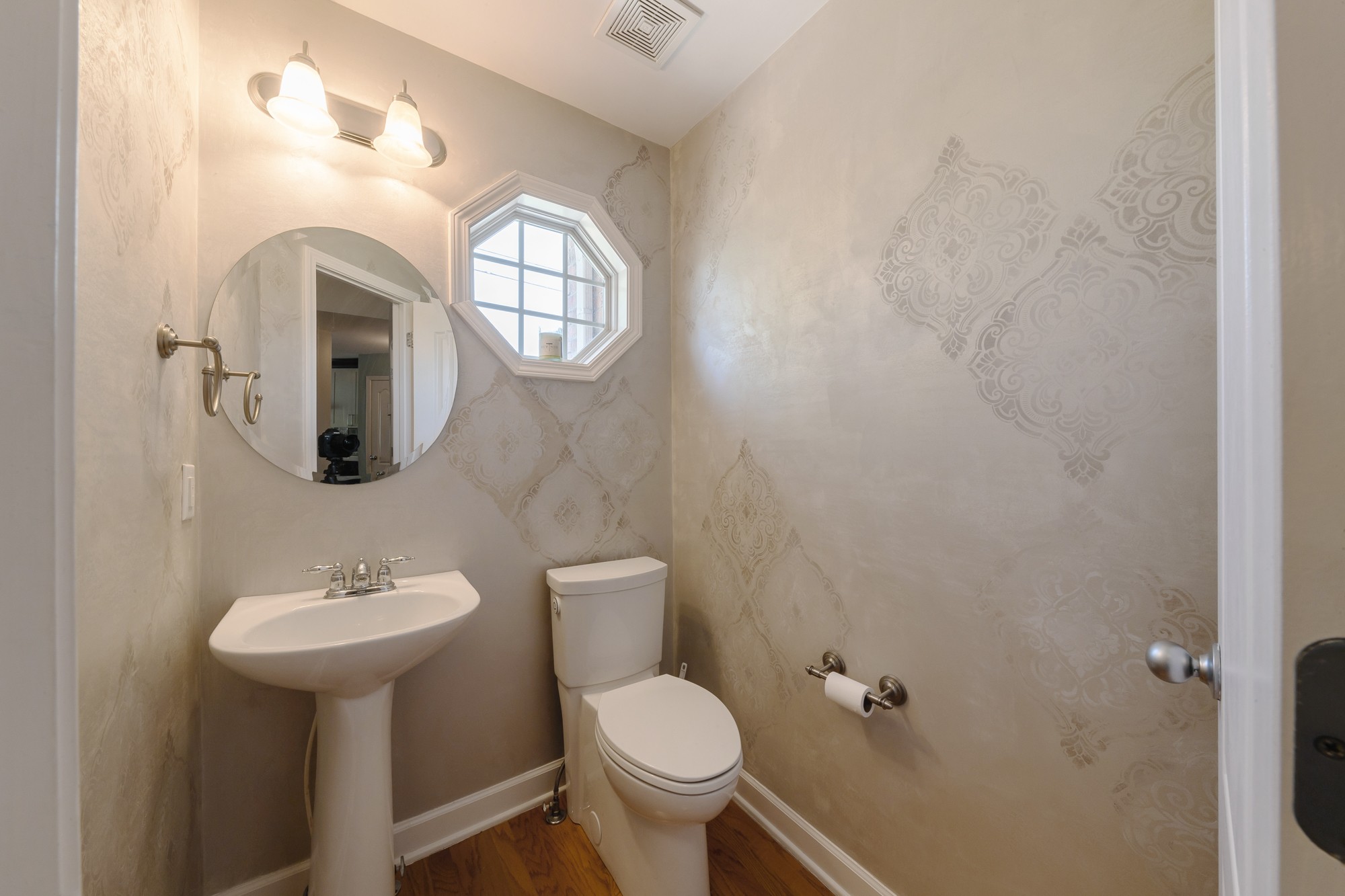 631 Harkreader Road Mount Juliet, TN 37122 - Photo 17 of 30 a bathroom with a toilet sink and mirror