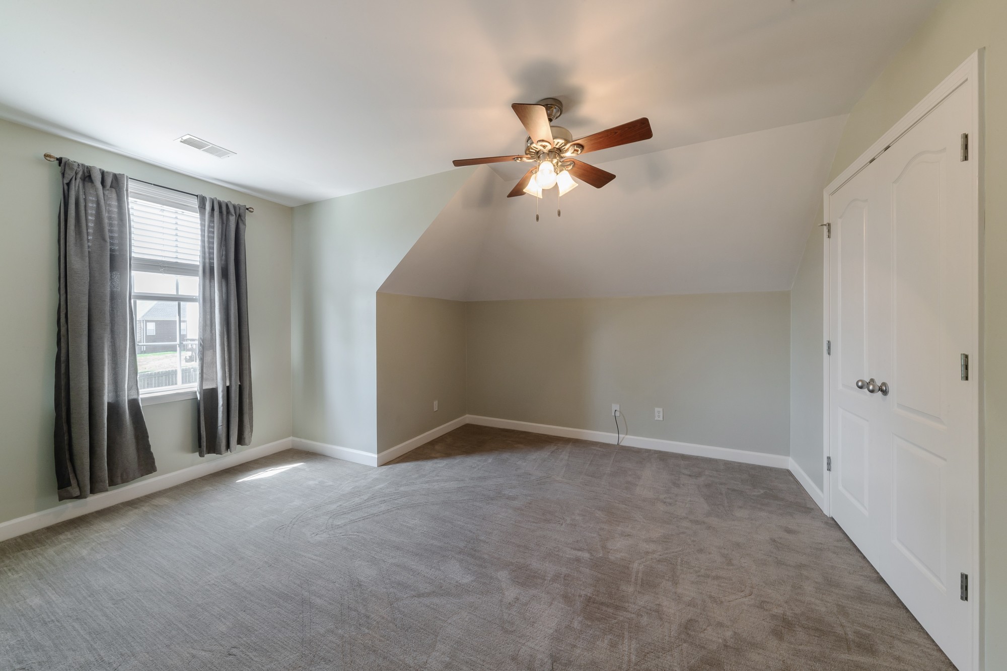 631 Harkreader Road Mount Juliet, TN 37122 - Photo 18 of 30 a view of empty room with window and ceiling fan