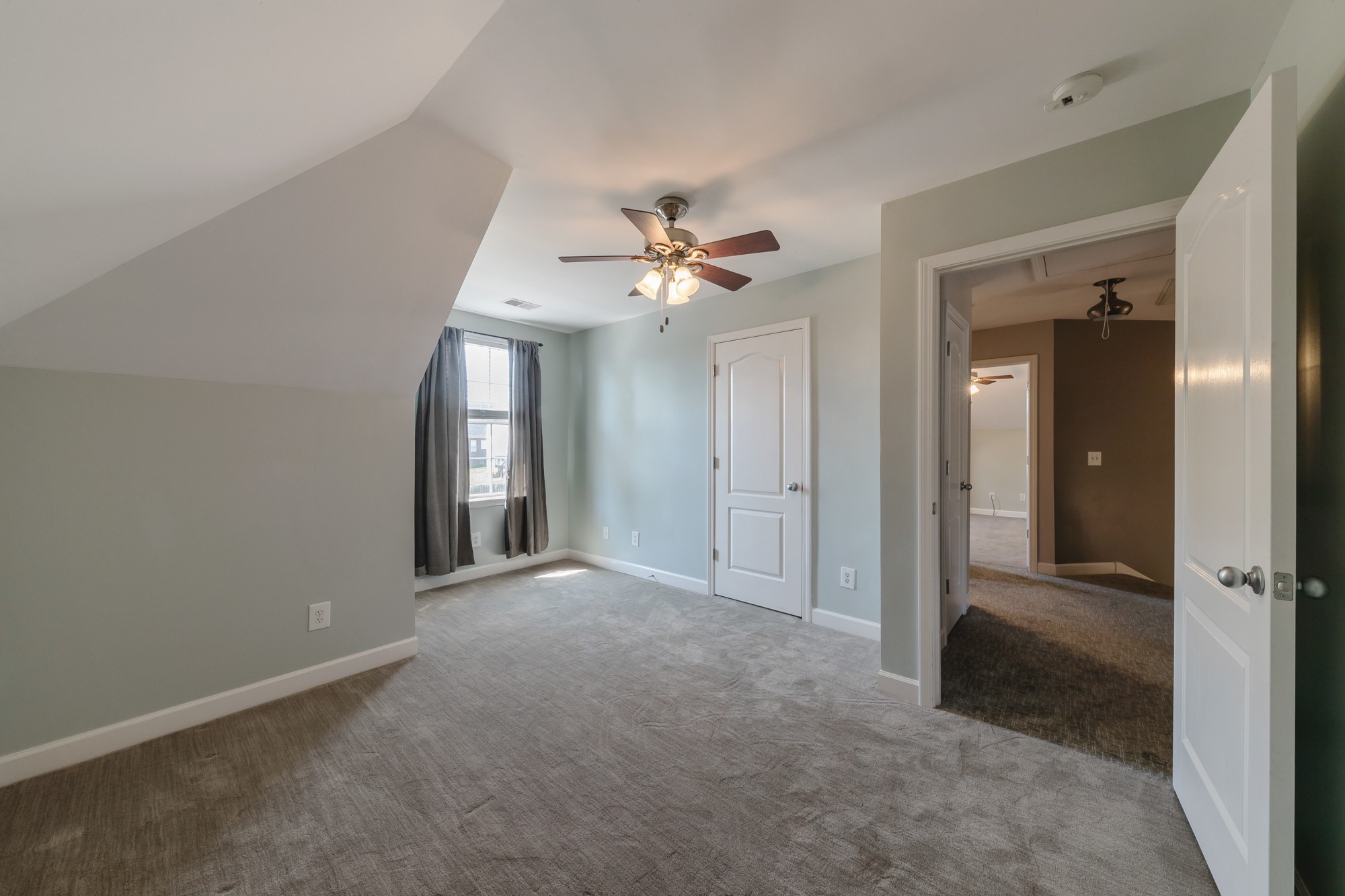 631 Harkreader Road Mount Juliet, TN 37122 - Photo 19 of 30 a view of an empty room with a ceiling fan