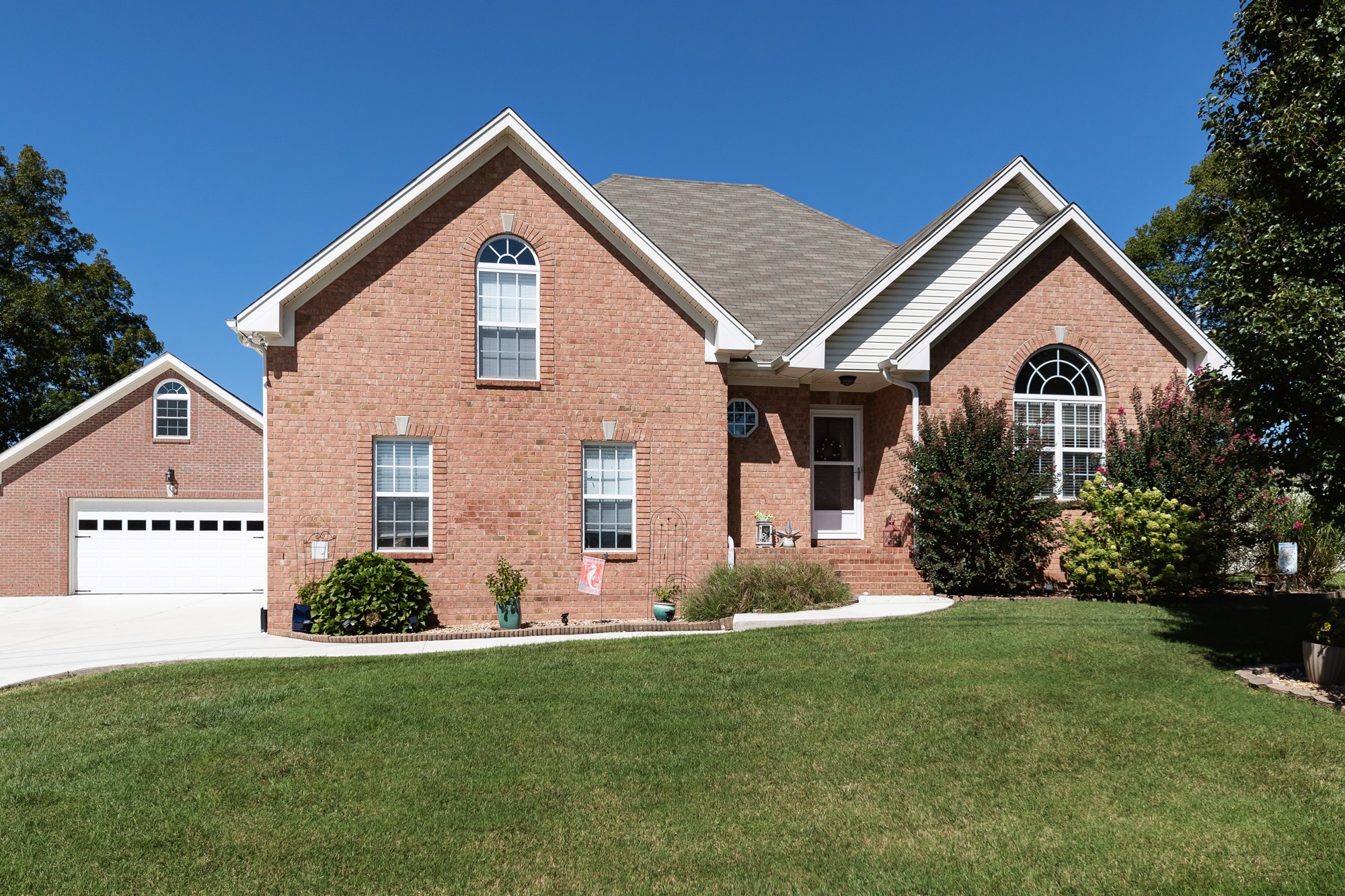 631 Harkreader Road Mount Juliet, TN 37122 - Photo 2 of 30 a front view of a house with a yard and garage
