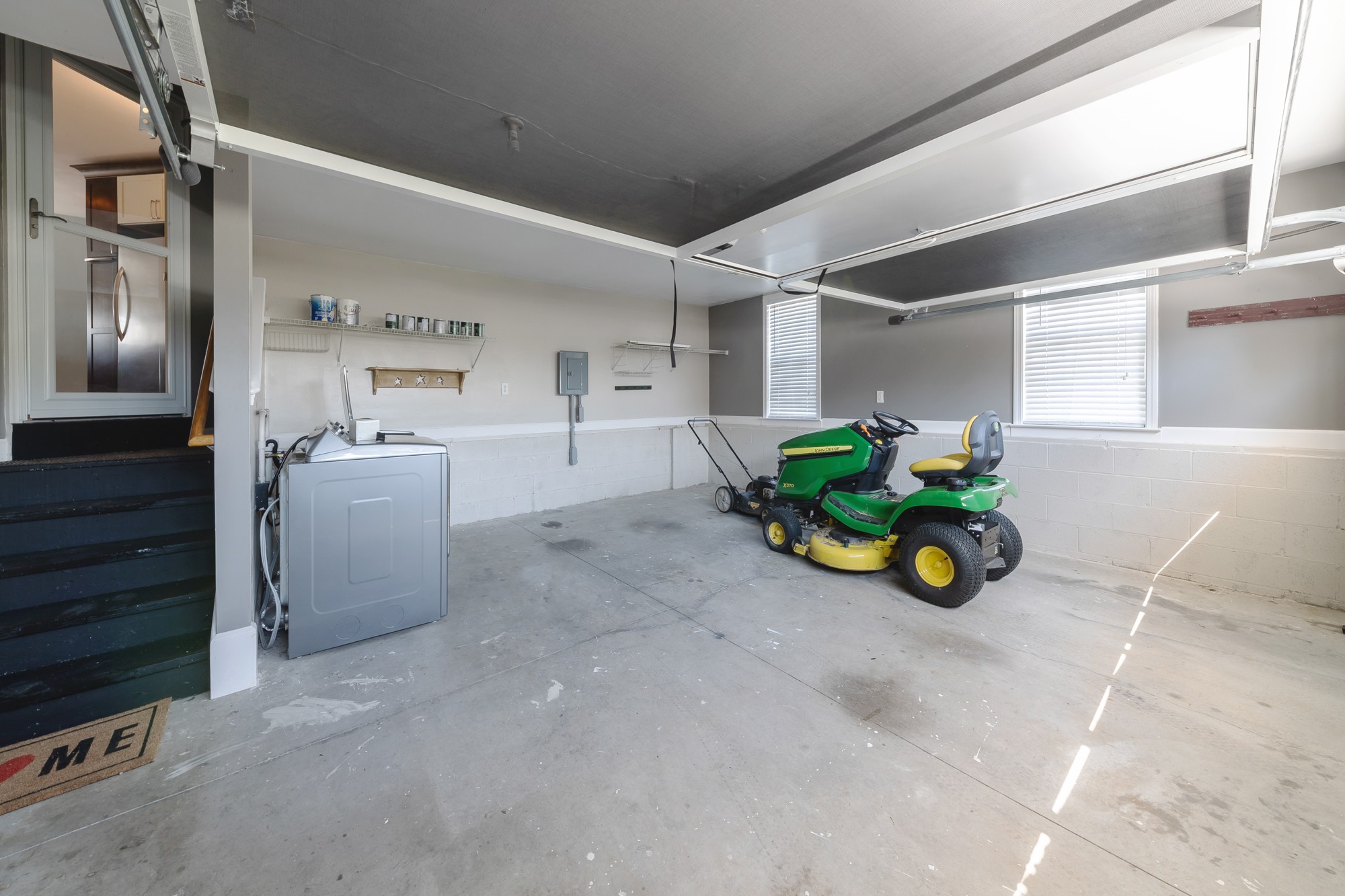 631 Harkreader Road Mount Juliet, TN 37122 - Photo 22 of 30 a view of a garage with toys and a ceiling fan