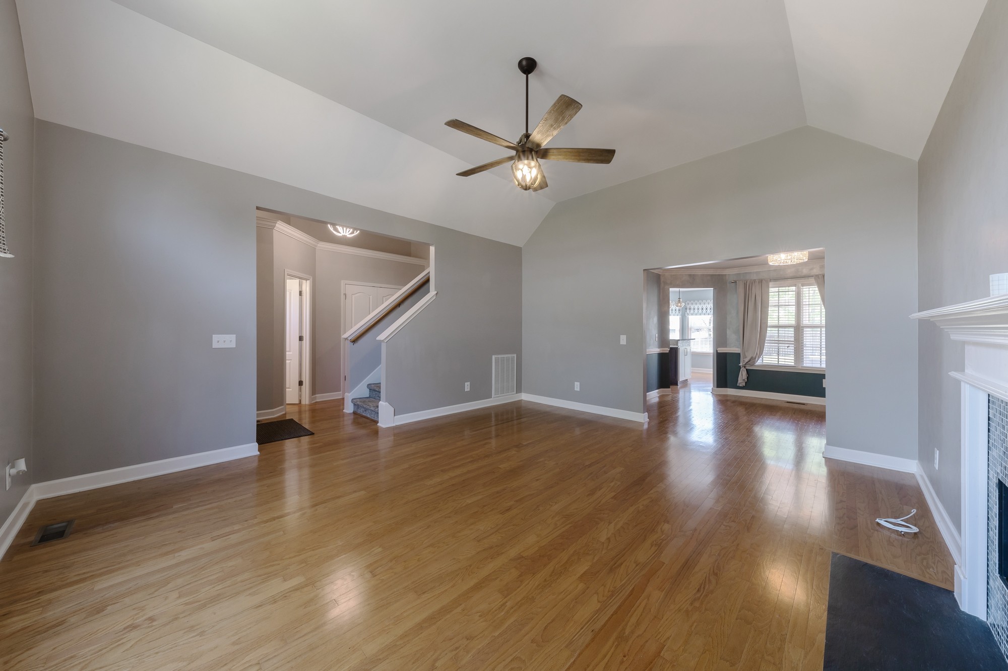 631 Harkreader Road Mount Juliet, TN 37122 - Photo 5 of 30 an empty room with wooden floor and windows