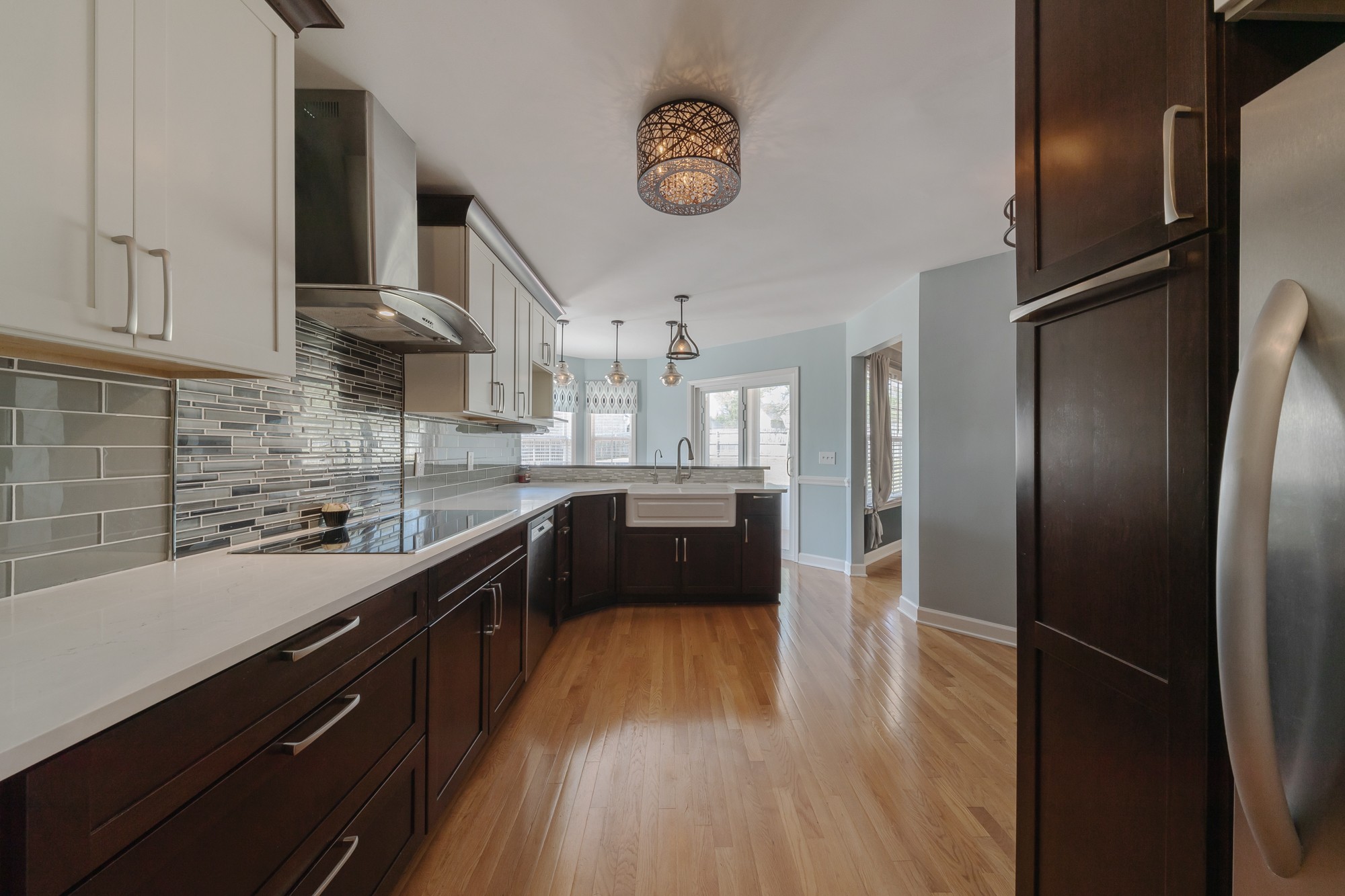 631 Harkreader Road Mount Juliet, TN 37122 - Photo 8 of 30 a large kitchen with stainless steel appliances a refrigerator a sink a stove and cabinets