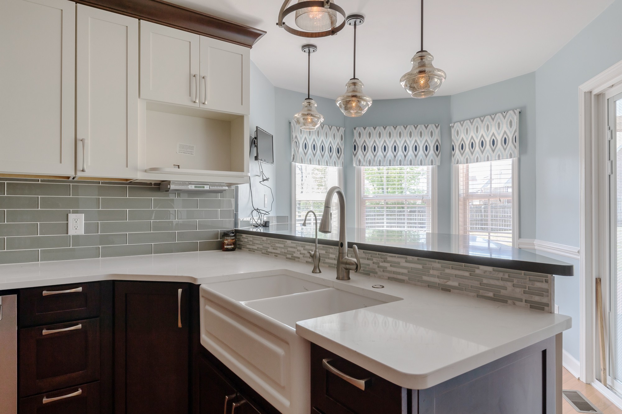631 Harkreader Road Mount Juliet, TN 37122 - Photo 9 of 30 a kitchen with a sink cabinets and window