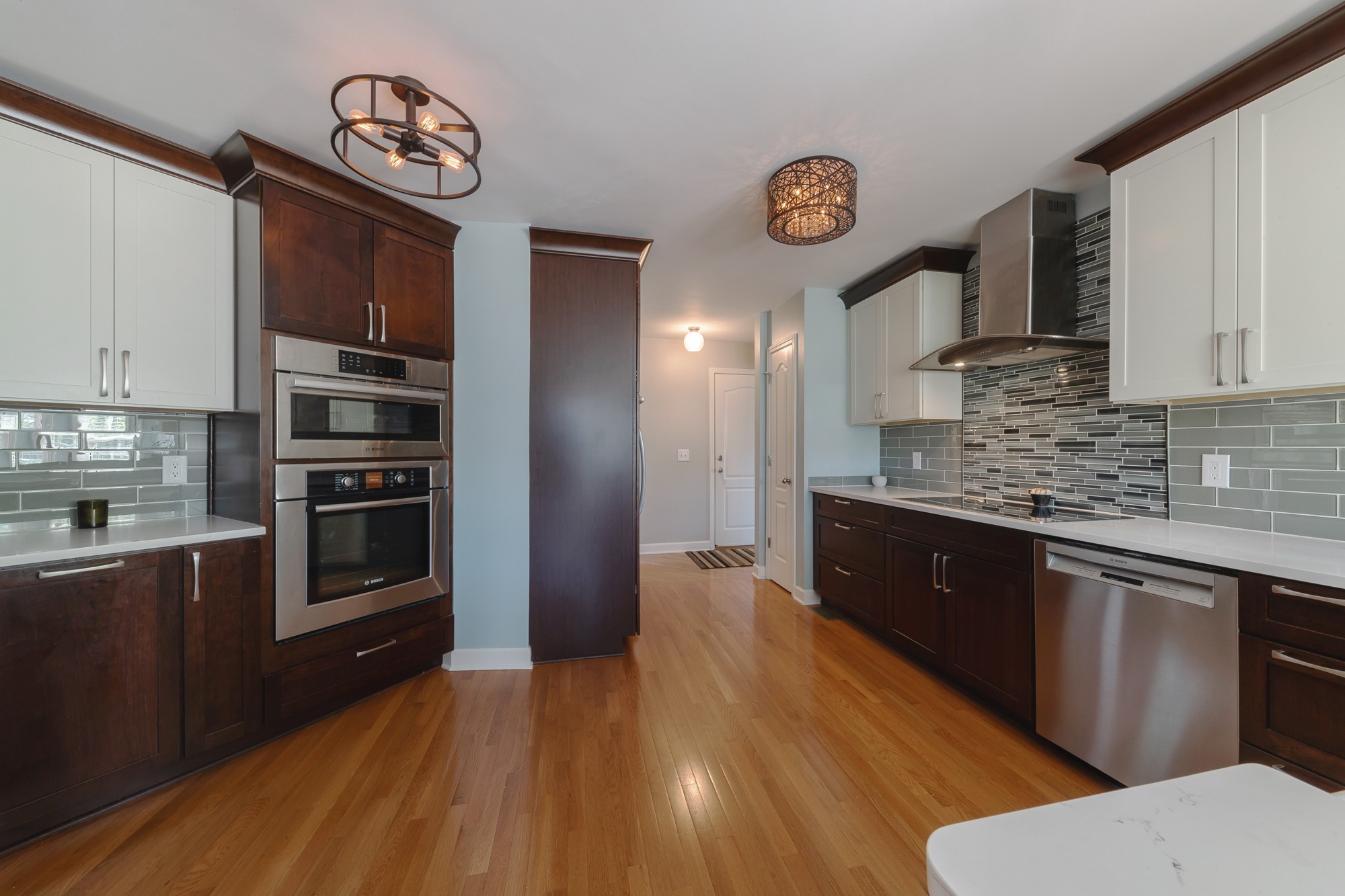 631 Harkreader Road Mount Juliet, TN 37122 - Photo 10 of 30 a kitchen with stainless steel appliances granite countertop a refrigerator a stove top oven a sink and dishwasher