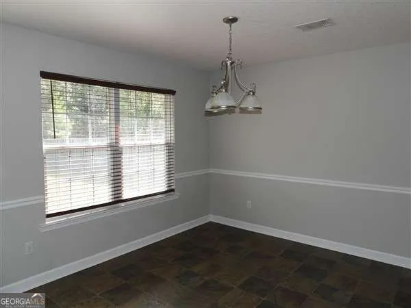 a view of a room with windows