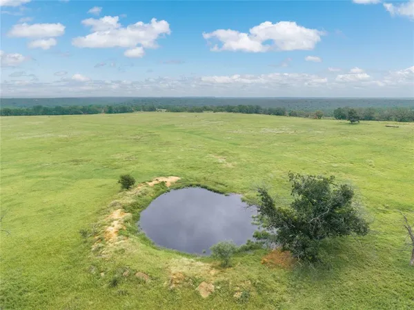 a view of a lake from a yard