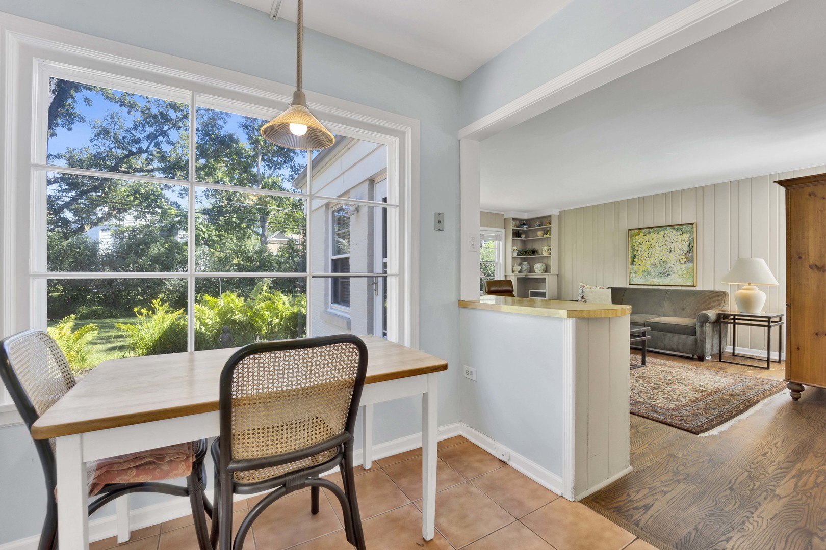 80 Williamsburg Road Evanston, IL 60203 - Photo 11 of 28 a dining room with furniture and a window