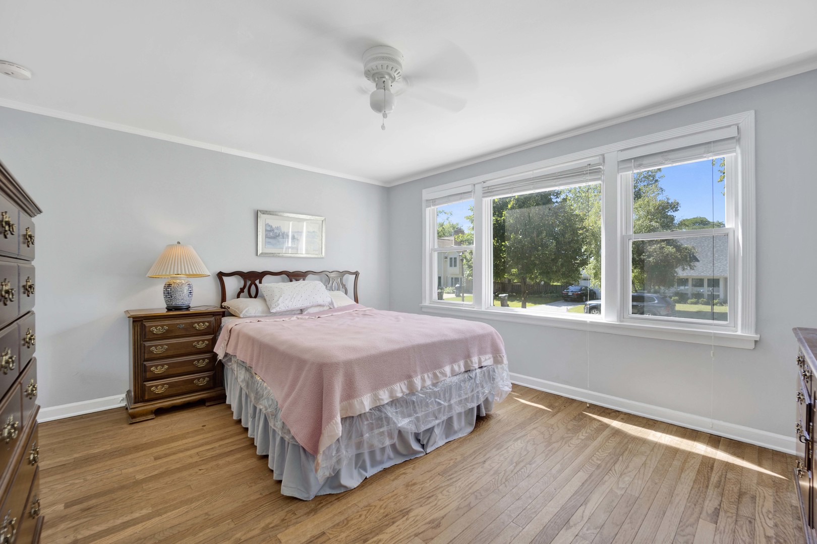 80 Williamsburg Road Evanston, IL 60203 - Photo 14 of 28 a bedroom with a bed and window