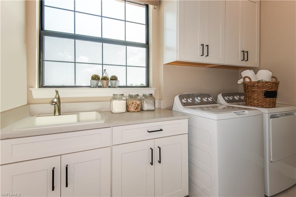 15336 Lucerna Street, Unit 203 Naples, FL 34114 - Photo 11 of 15 a kitchen with sink cabinets and window
