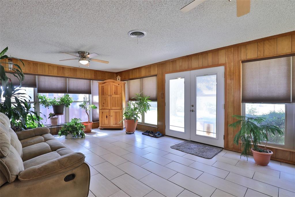 448 Elmdale Road South Abilene, TX 79602 - Photo 22 of 39 a lobby with furniture and a floor to ceiling window