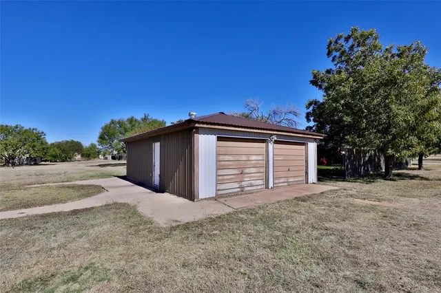 a view of backyard of house