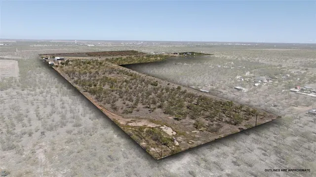 an aerial view of beach and ocean