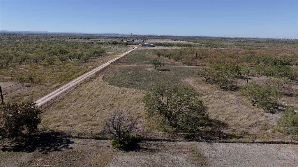 448 Elmdale Road South Abilene, TX 79602 - Photo 38 of 39 a view of a dry yard with wooden floor and fence