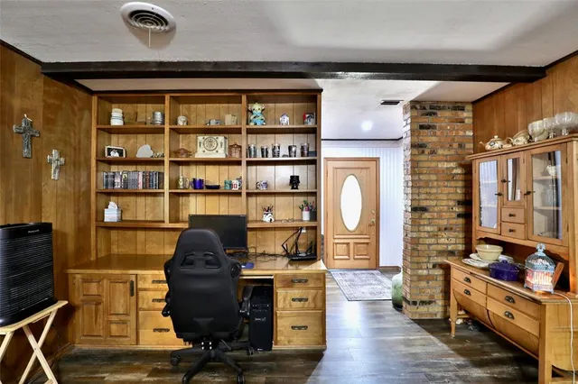 a view of workspace with wooden floor