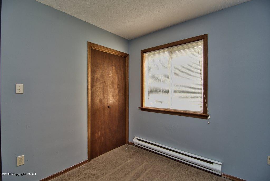 4112 Blueberry Hill Road Bushkill, PA 18324 - Photo 17 of 39 an empty room with windows