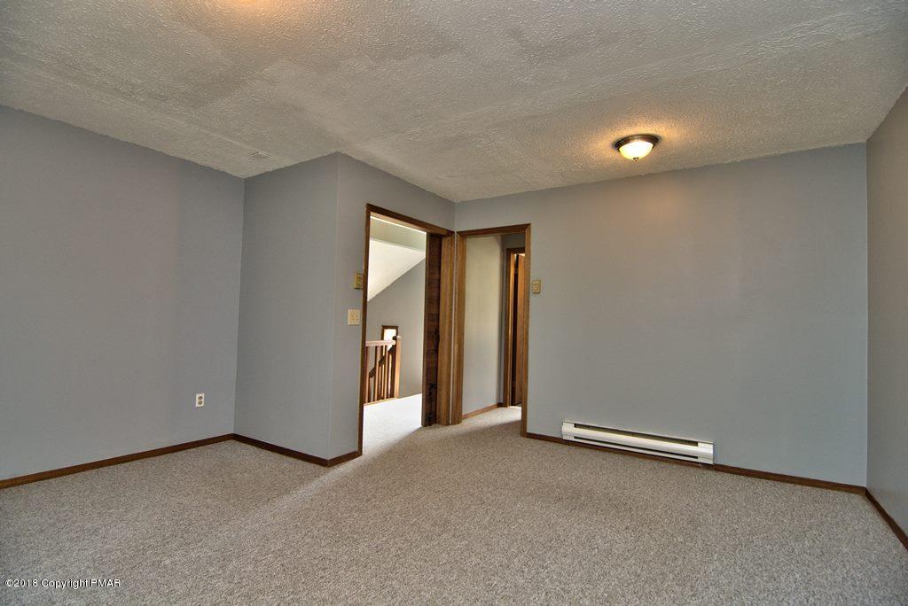 4112 Blueberry Hill Road Bushkill, PA 18324 - Photo 24 of 39 an empty room with closet