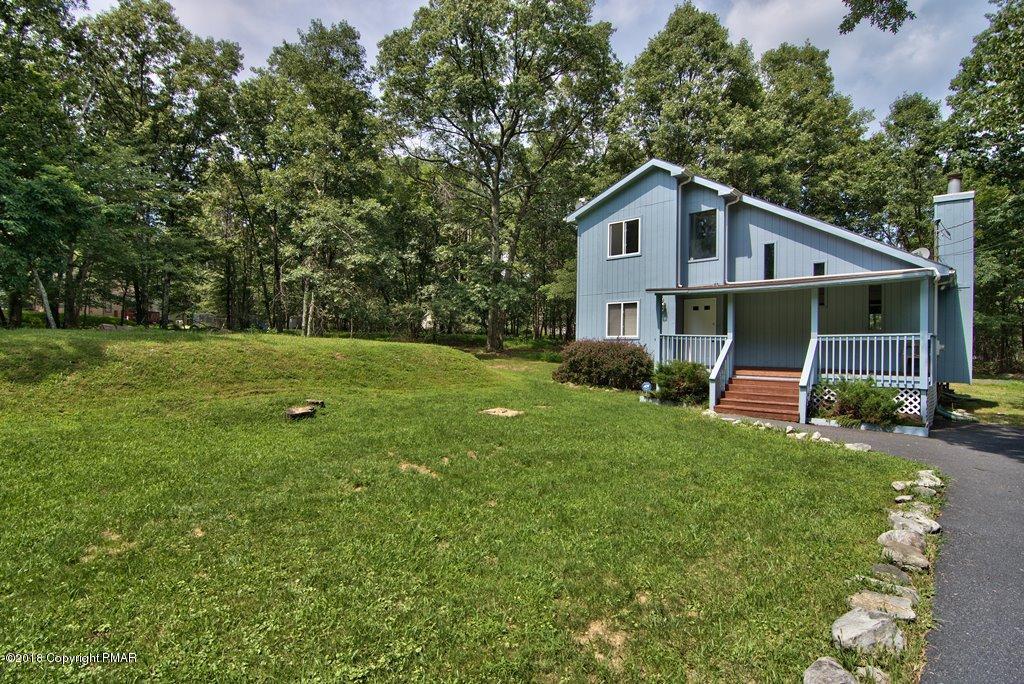 4112 Blueberry Hill Road Bushkill, PA 18324 - Photo 32 of 39 a house view with a garden space