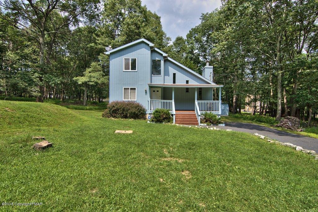 4112 Blueberry Hill Road Bushkill, PA 18324 - Photo 33 of 39 a view of a house with a yard and sitting area