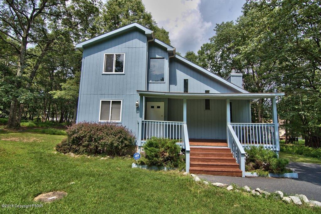 4112 Blueberry Hill Road Bushkill, PA 18324 - Photo 34 of 39 a front view of a house with garden