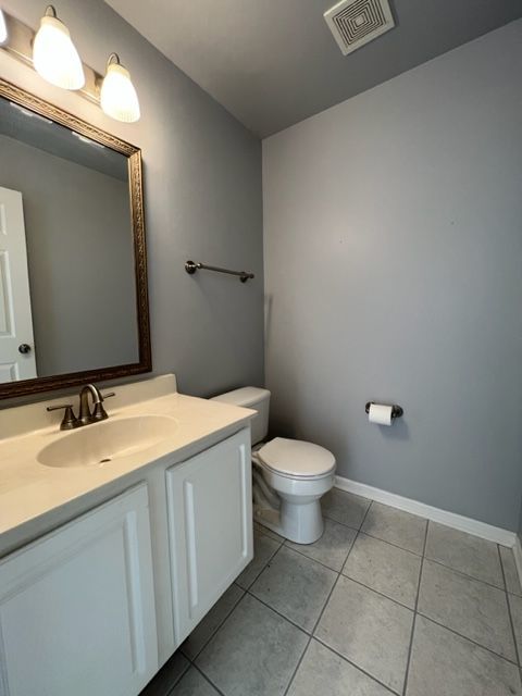 Undisclosed Address Naperville, IL 60564 - Photo 12 of 26 a bathroom with a granite countertop sink and a mirror
