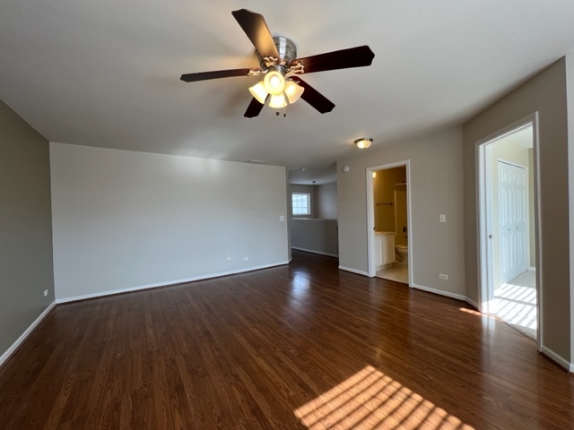 Undisclosed Address Naperville, IL 60564 - Photo 15 of 26 a view of an empty room and wooden floor