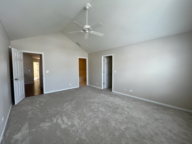 Undisclosed Address Naperville, IL 60564 - Photo 20 of 26 a view of an empty room with a chandelier fan