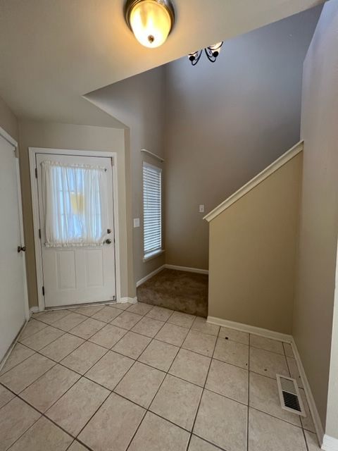 Undisclosed Address Naperville, IL 60564 - Photo 3 of 26 an empty room with windows