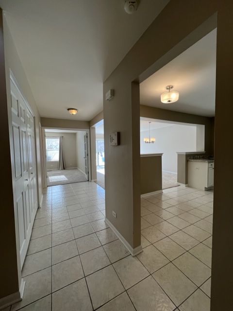 Undisclosed Address Naperville, IL 60564 - Photo 4 of 26 a view of hallway with dining area