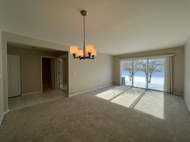 Undisclosed Address Naperville, IL 60564 - Photo 9 of 26 a view of empty room with windows
