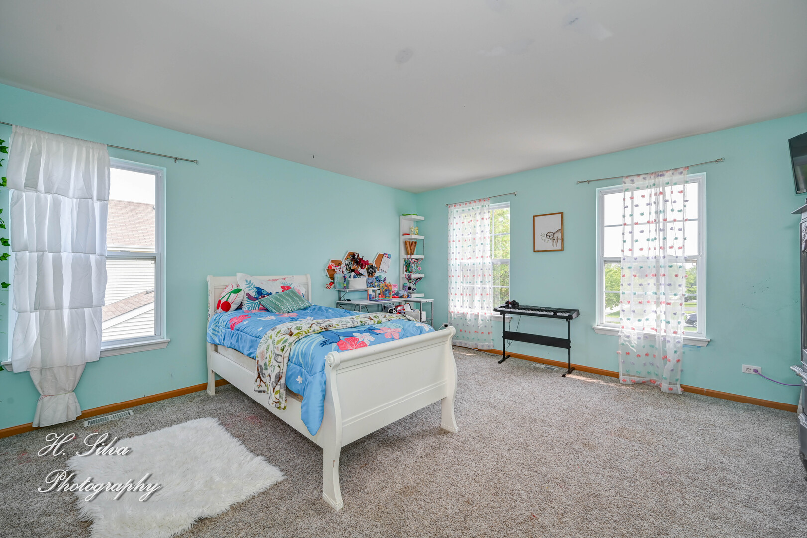602 Spring Drive Marengo, IL 60152 - Photo 12 of 25 a bedroom with a bed and a window