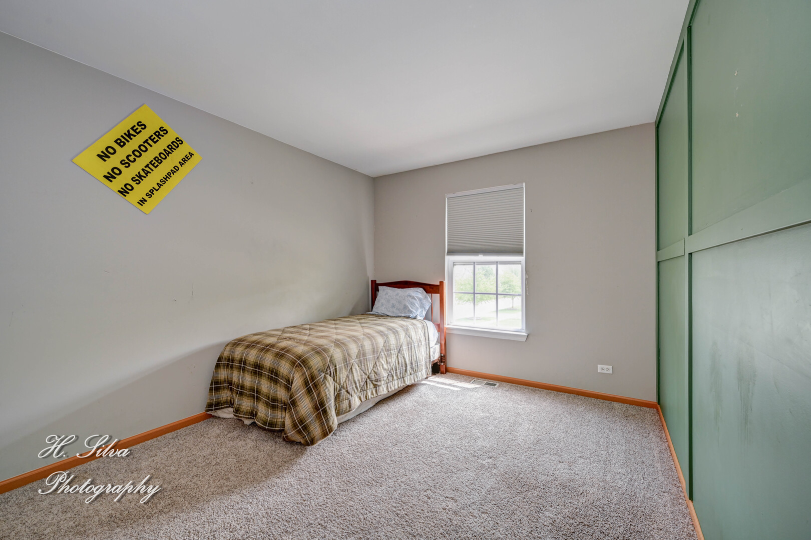 602 Spring Drive Marengo, IL 60152 - Photo 14 of 25 a room with a bed and a window