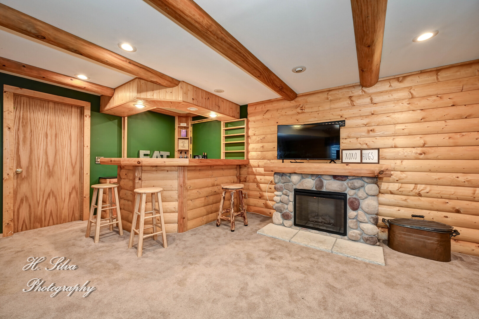 602 Spring Drive Marengo, IL 60152 - Photo 20 of 25 a living room with furniture a flat screen tv and a fireplace
