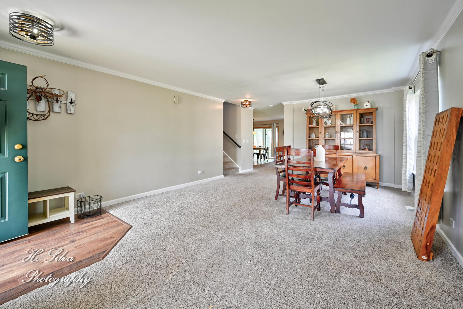 602 Spring Drive Marengo, IL 60152 - Photo 2 of 25 a view of a livingroom with furniture and a window