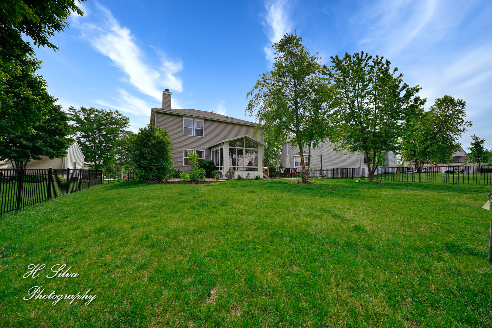 602 Spring Drive Marengo, IL 60152 - Photo 24 of 25 a view of house with backyard
