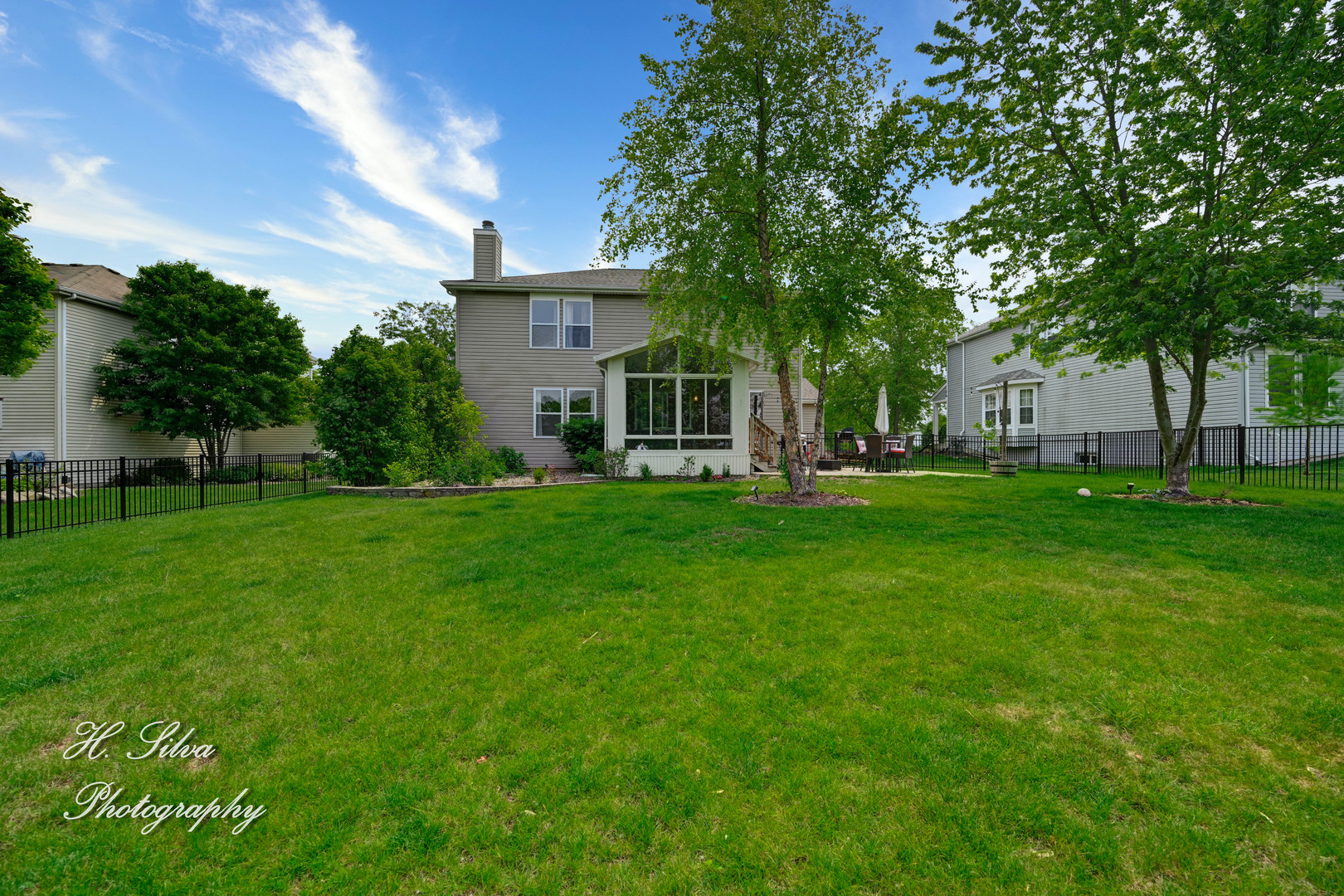 602 Spring Drive Marengo, IL 60152 - Photo 25 of 25 a front view of house with yard and green space