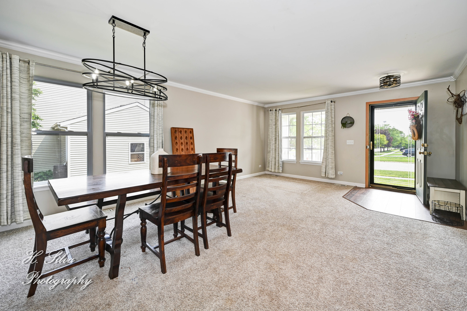 602 Spring Drive Marengo, IL 60152 - Photo 3 of 25 a view of a dining room with furniture window and outside view