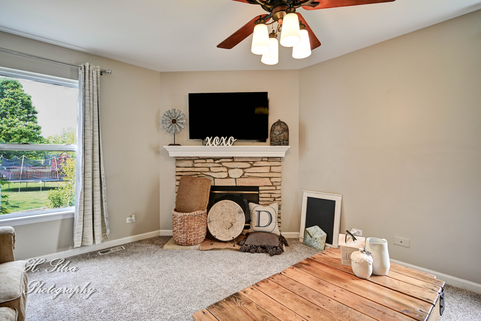 602 Spring Drive Marengo, IL 60152 - Photo 5 of 25 a bedroom with a bed and a flat screen tv