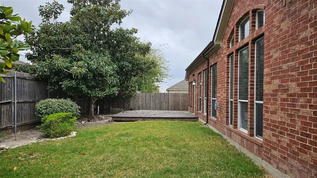 a view of garden with patio