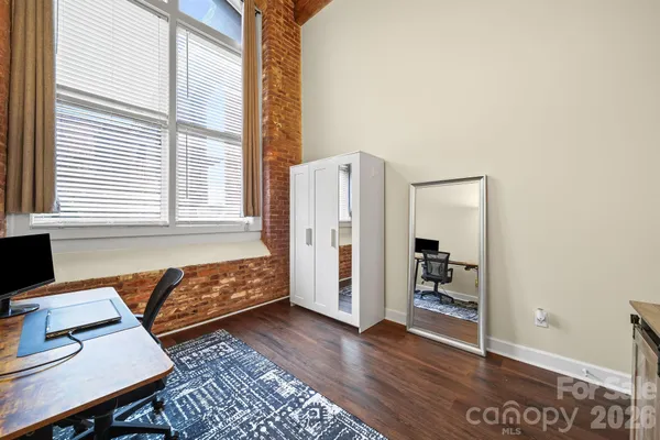 wooden floor and dining room with furniture