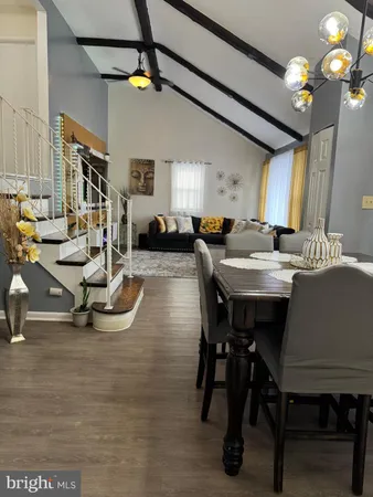 a view of a dining room with furniture