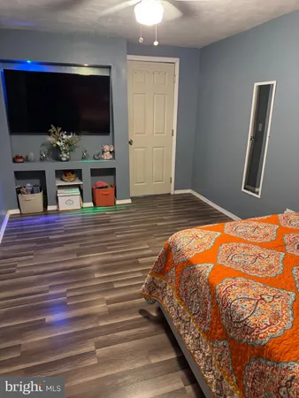 a view of a livingroom with furniture and a rug