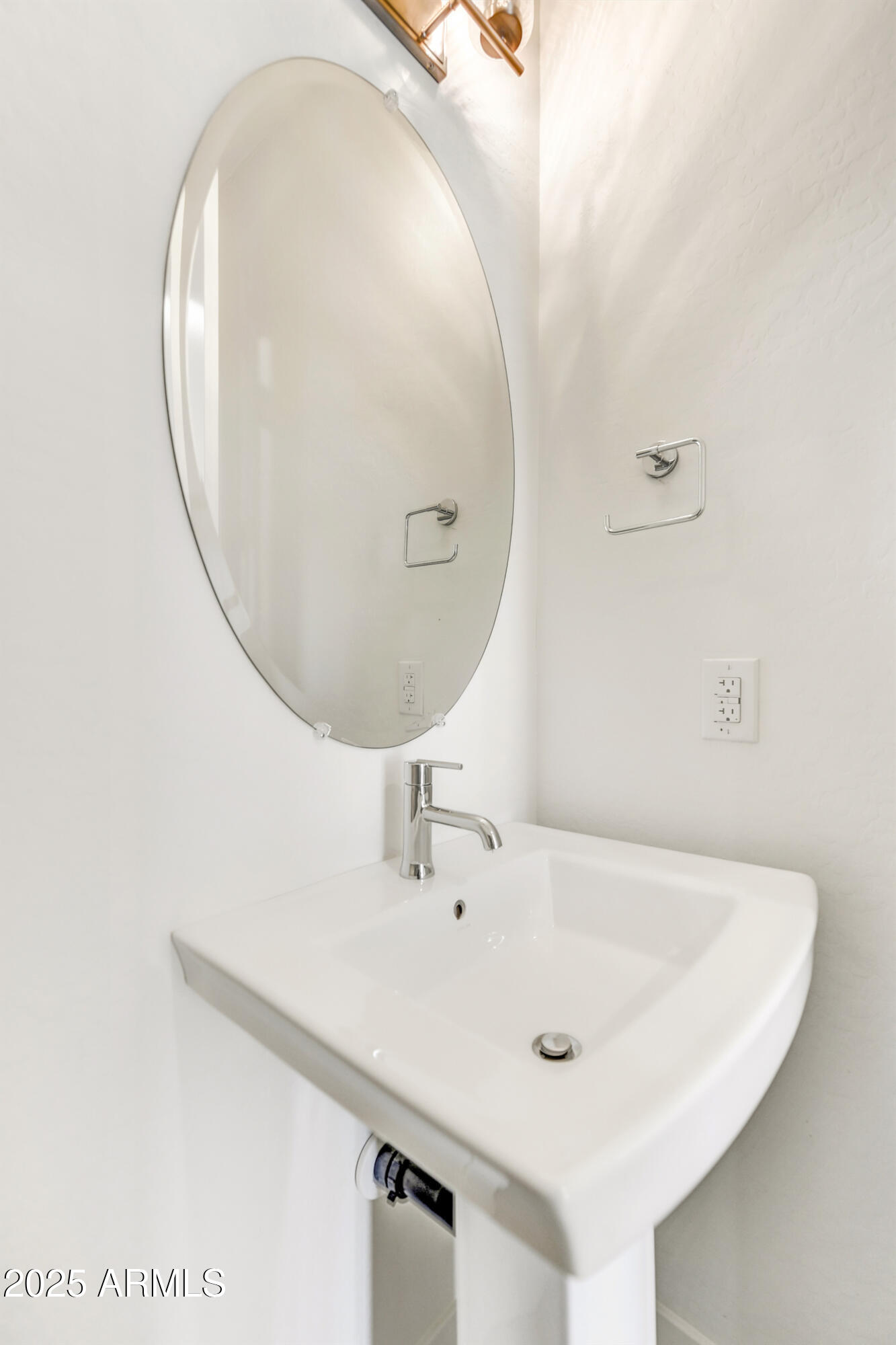 1 Easy Street, Unit 12 Carefree, AZ 85377 - Photo 11 of 43 a bathroom with a sink and a mirror
