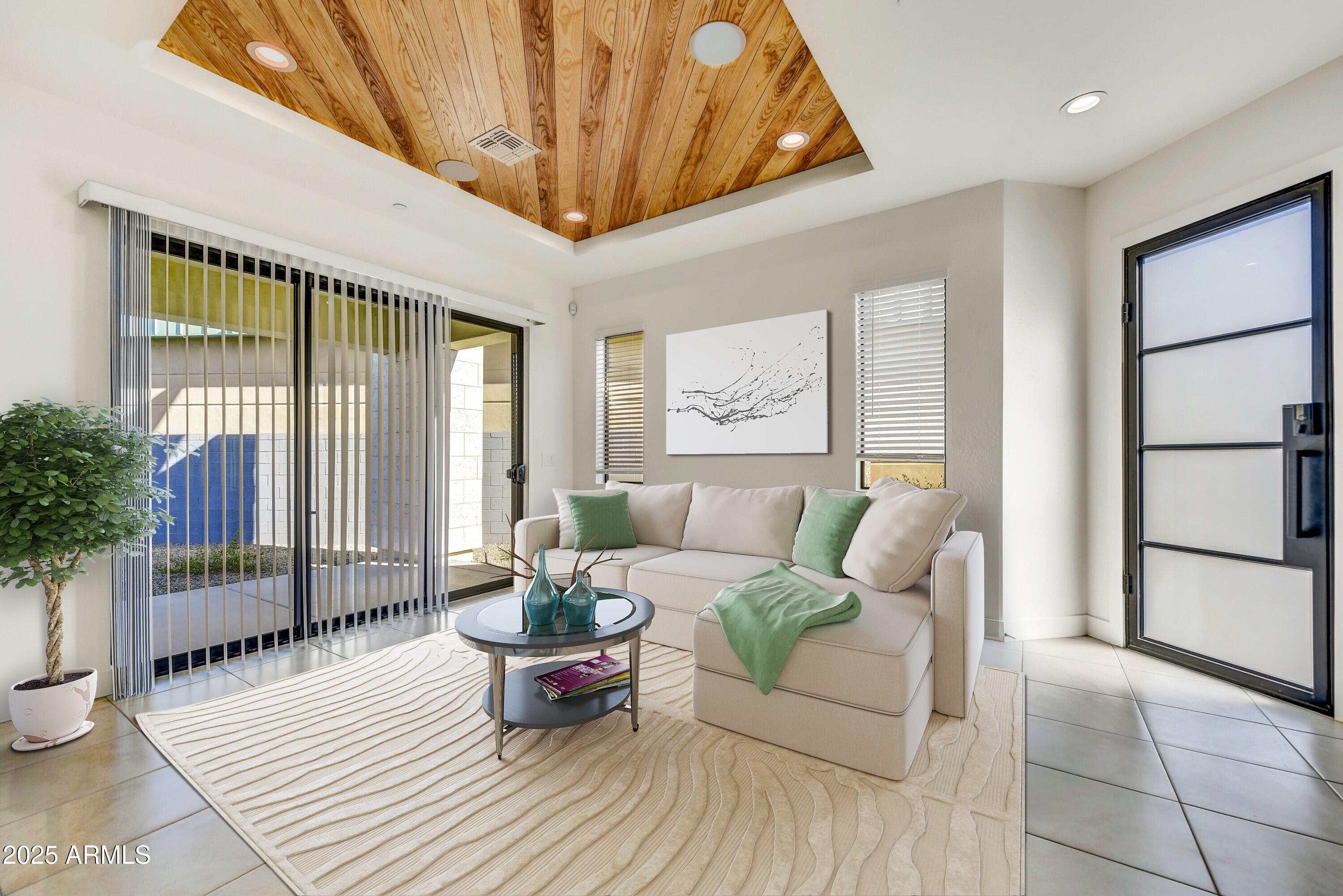 1 Easy Street, Unit 12 Carefree, AZ 85377 - Photo 12 of 43 a living room with furniture and wooden floor