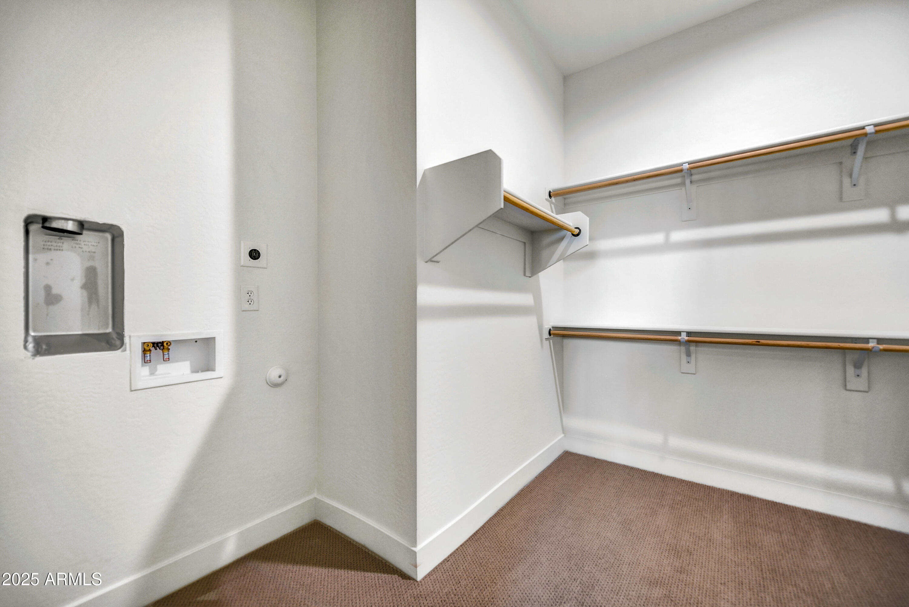 1 Easy Street, Unit 12 Carefree, AZ 85377 - Photo 17 of 43 a view of walk in closet with empty racks