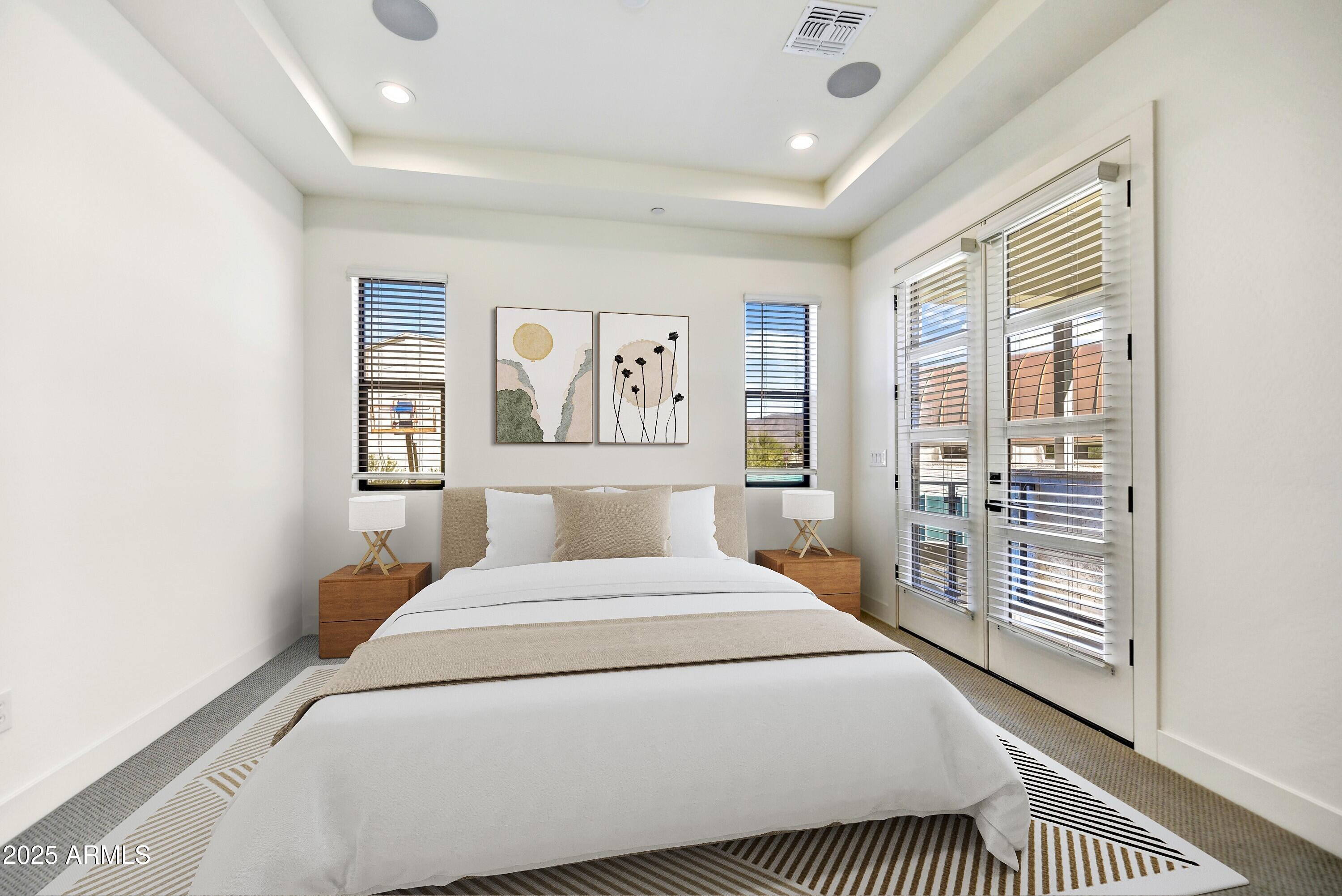 1 Easy Street, Unit 12 Carefree, AZ 85377 - Photo 18 of 43 a bedroom with a large bed and a table