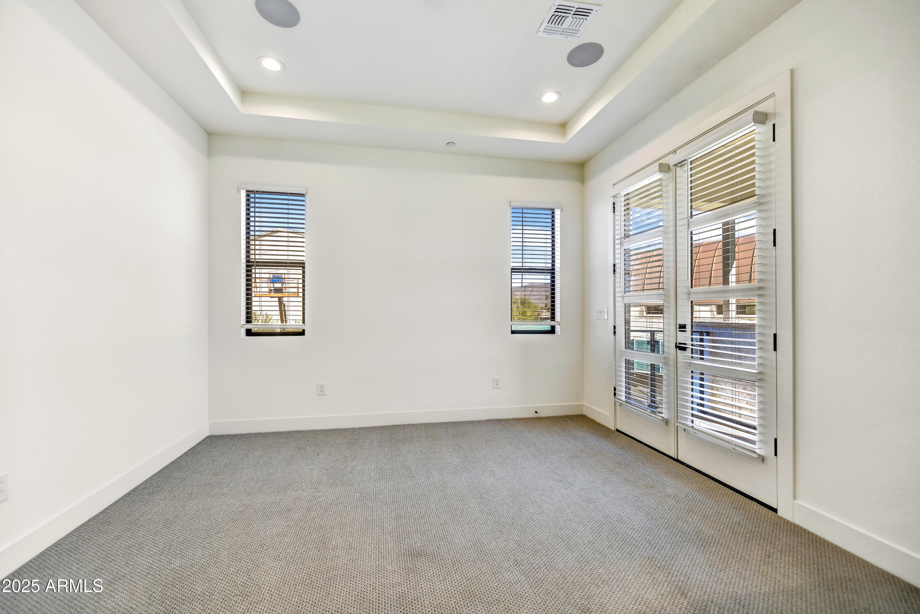 1 Easy Street, Unit 12 Carefree, AZ 85377 - Photo 19 of 43 an empty room with windows
