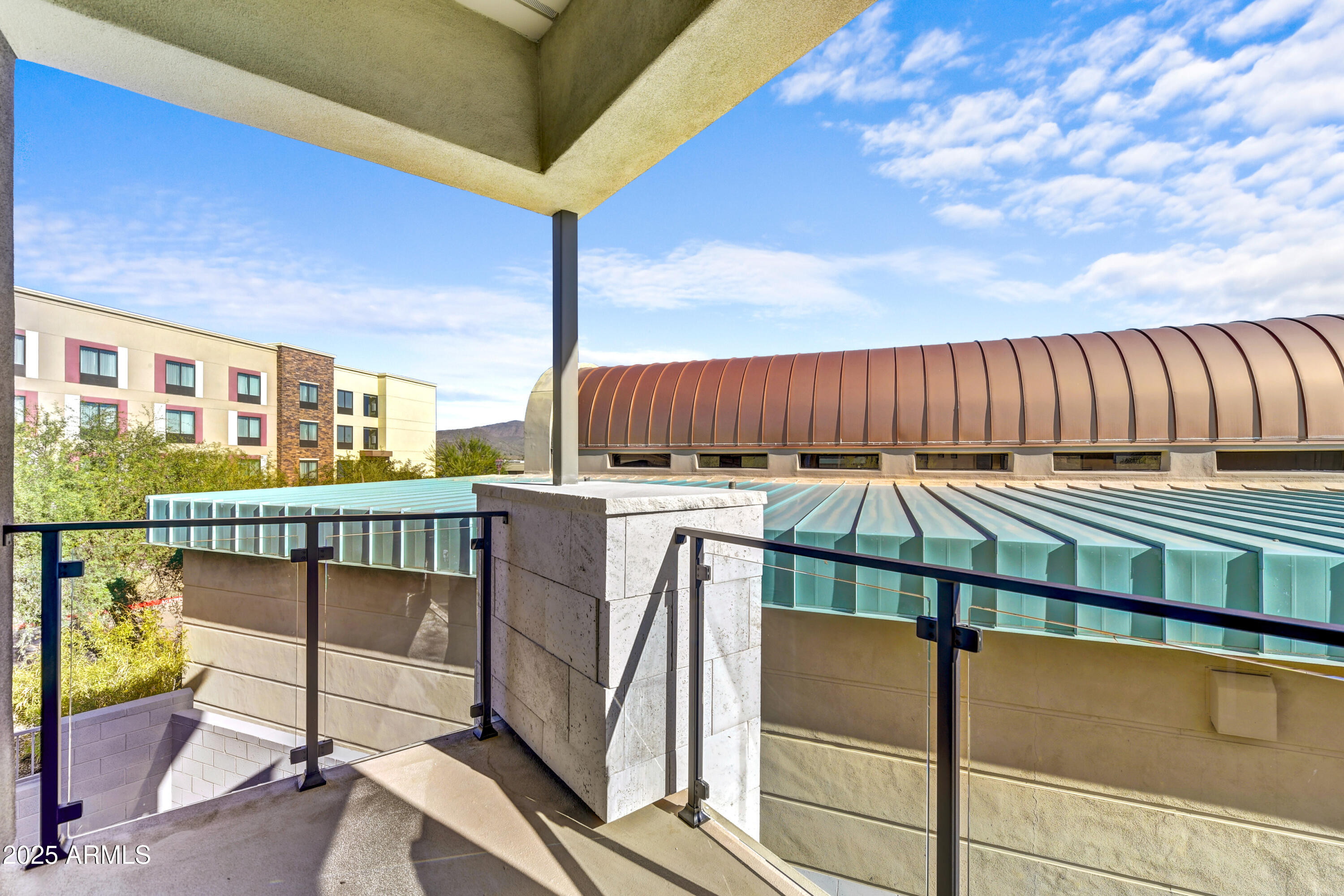 1 Easy Street, Unit 12 Carefree, AZ 85377 - Photo 21 of 43 a view of a balcony with chairs