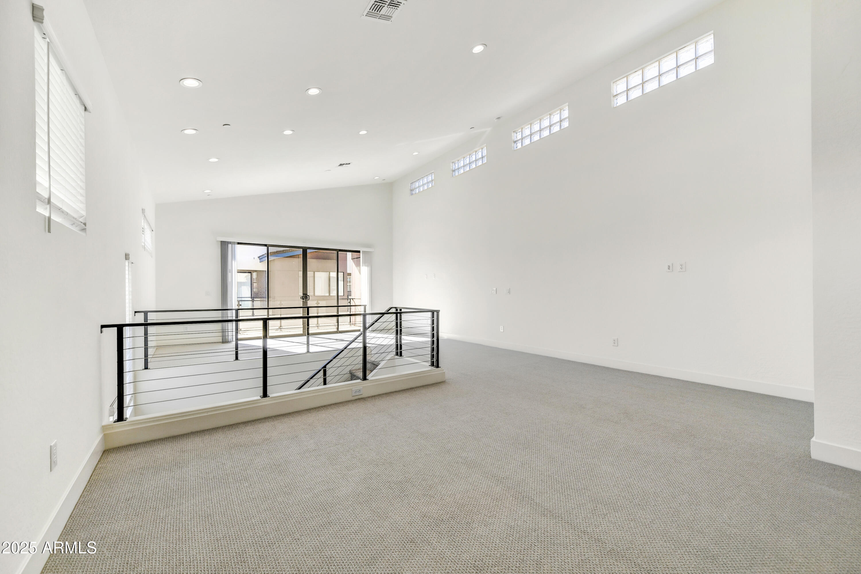 1 Easy Street, Unit 12 Carefree, AZ 85377 - Photo 23 of 43 a view of an empty room with windows