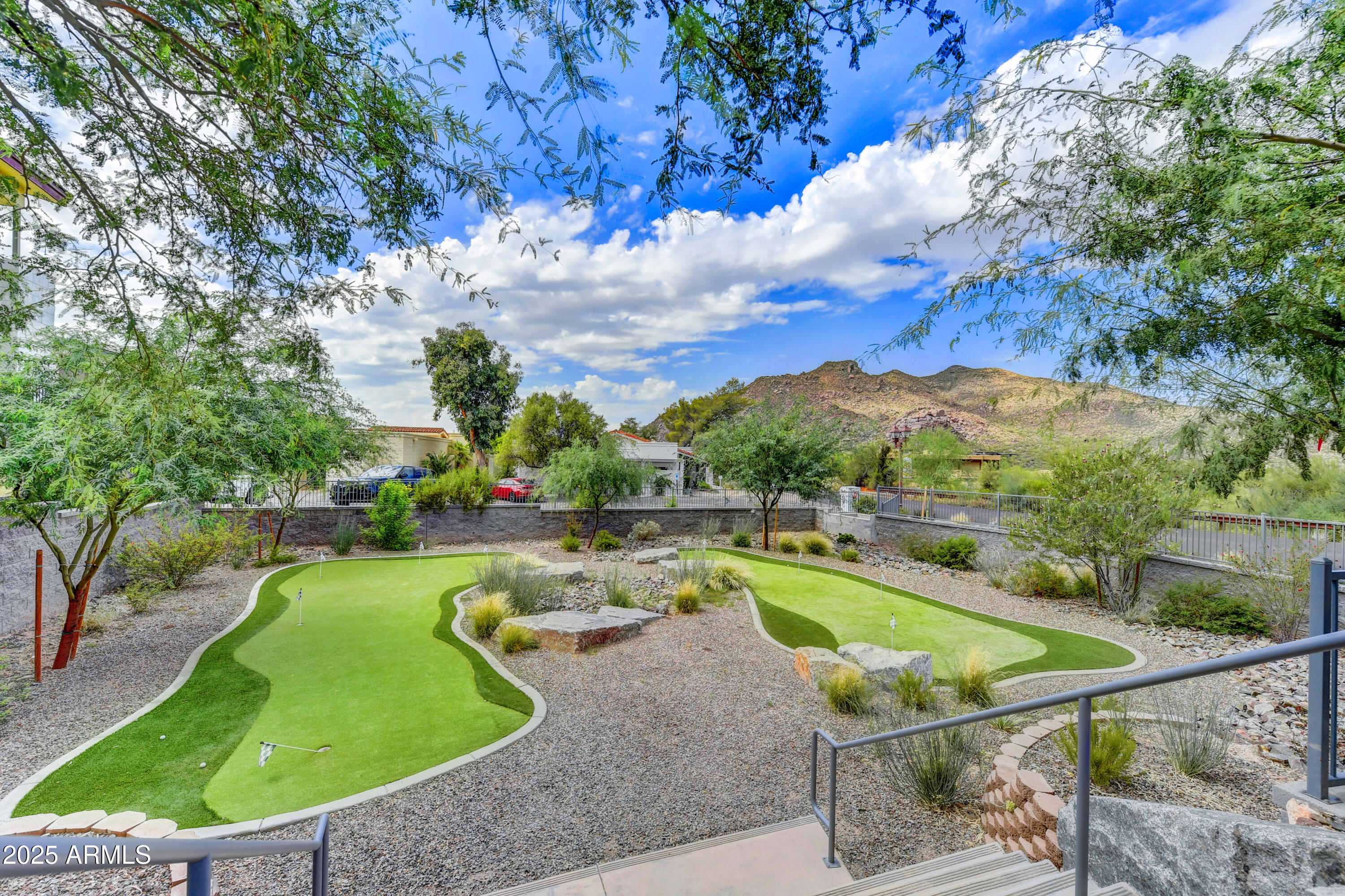 1 Easy Street, Unit 12 Carefree, AZ 85377 - Photo 40 of 43 a view of a swimming pool with a patio